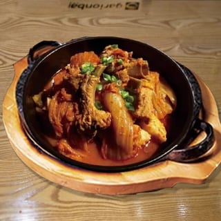 Aged kimchi braised with pork rib/묵은지돼지등갈비찜
